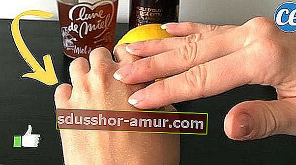 dvije ruke, med, limun i maslinovo ulje