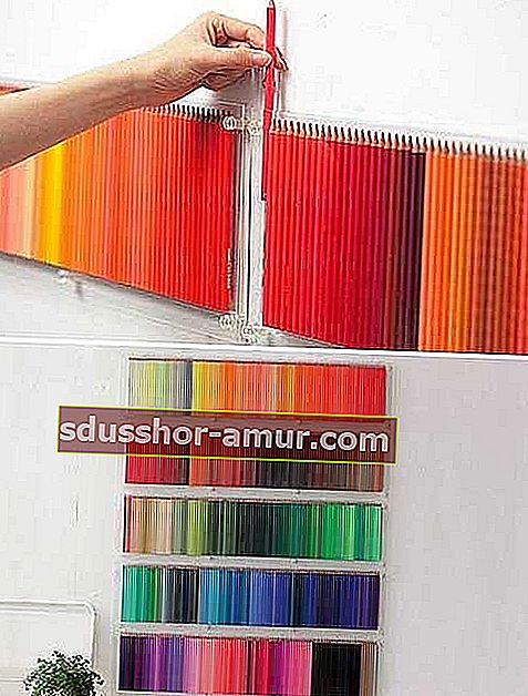 Няколко цветни молива, прикрепени към стената