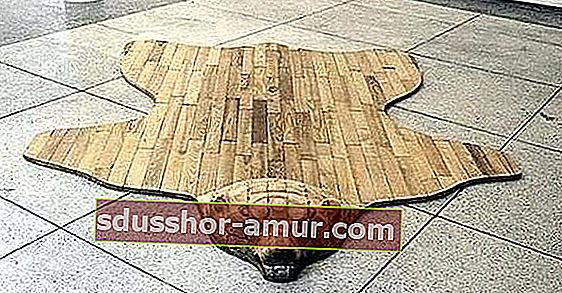 регенериран килим от дървена мечка от палети