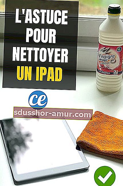 Таблет iPad с мека кърпа и бял оцет за почистване