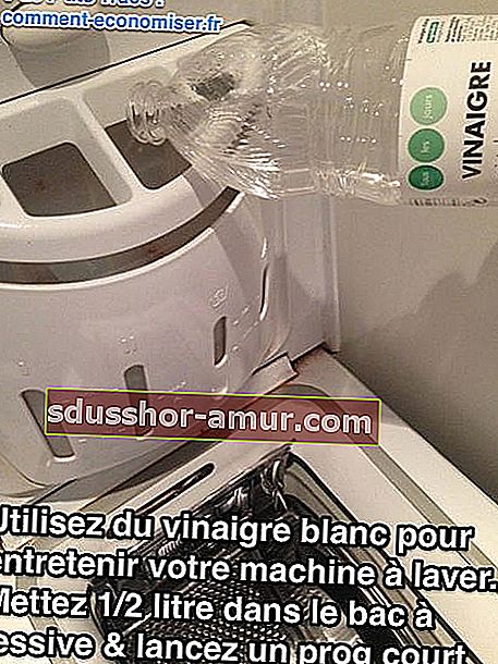 beyaz sirke ile bir çamaşır makinesi bakımı yapılır
