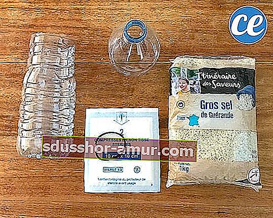 Груба сол, пластмасова бутилка, компрес и ластик, за да направите домашен влагоуловител